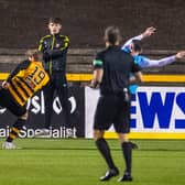 Hearts' Jamie Walker (left) was judged to have fouled Alloa's Robert Thomson in a key moment during Saturday's Betfred Cup tie.