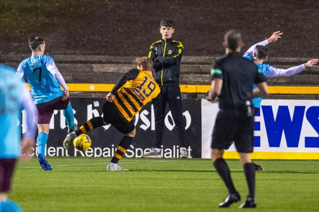Hearts' Jamie Walker (left) was judged to have fouled Alloa's Robert Thomson in a key moment during Saturday's Betfred Cup tie.