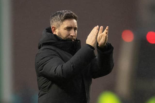 Lee Johnson salutes the Hibs fans after victory over Kilmarnock