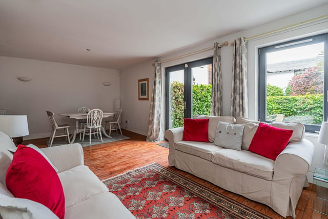 The split plan style accommodation of the ground floor offers a generous reception and dining room with French doors to the courtyard garden and can be opened up with internal French doors to the dining kitchen, or closed to provide two separate reception spaces.