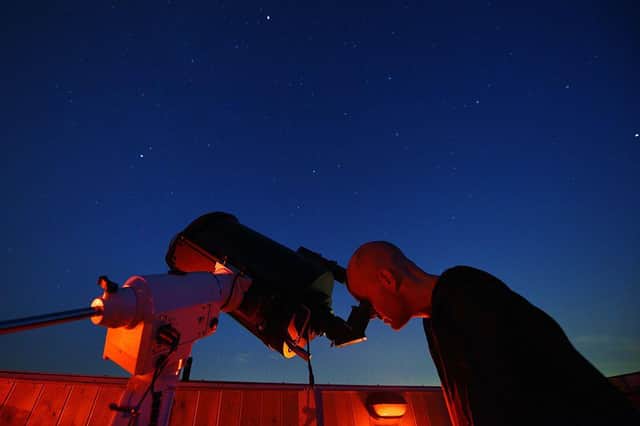 Members of the York Astronomical Society prepare to view a meteor shower in 2015 (Photo: OLI SCARFF/AFP via Getty Images)