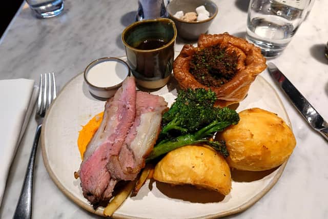 The sirloin beef served with spiced carrot purée, maple mustard glazed parsnips, Yorkshire pudding, roast potatoes, gravy, braised ox cheek and horseradish crème fraîche.