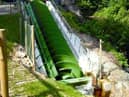 The hydro dynamic screw, based on the Archimedes screw works in reverse, commissioned in 2007. It was the first of its kind in the UK & produces enough electricity for the Park to be self sufficient for some 8 months of the year.