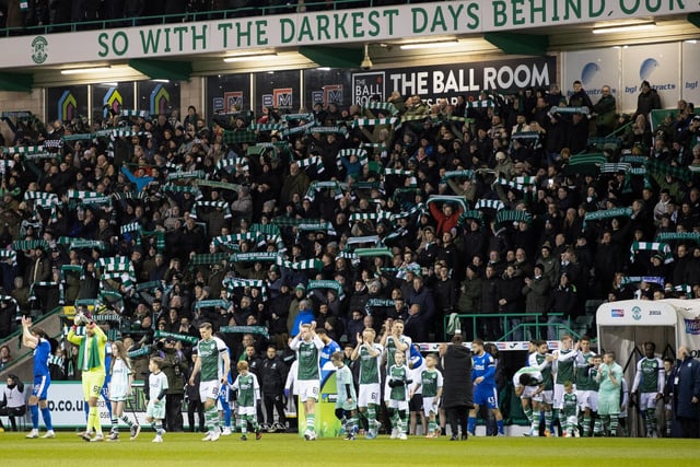 The teams enter the field as the Hibs fans sing 'Sunshine on Leith'