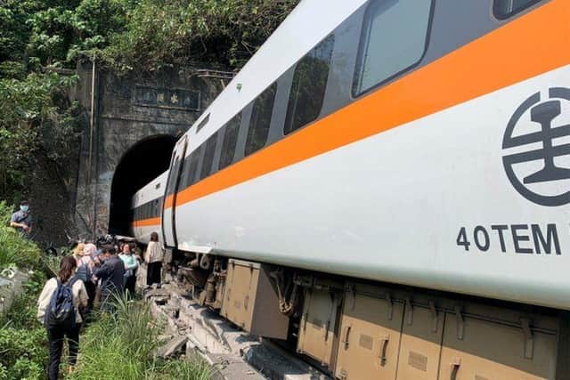 At least 36 people have been killed with many more injured after a train in Taiwan derailed inside a tunnel. Photo by HANDOUT/Central Emergency Operation Cent/AFP via Getty Images)