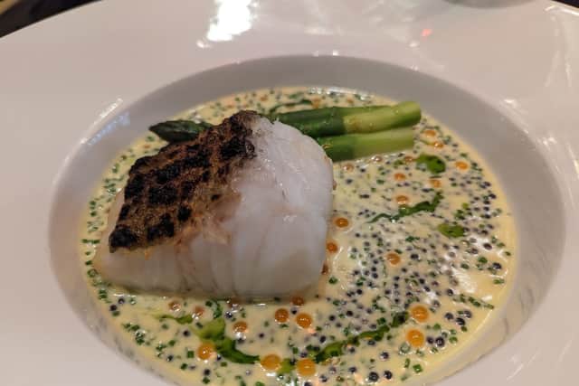 BBQ Shetland cod with Blairgowrie asparagus and a roe butter sauce.