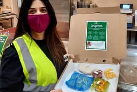 Nadia Ahmed with the pizza kits set to be distributed to the Community One Stop Shop in Broomhouse