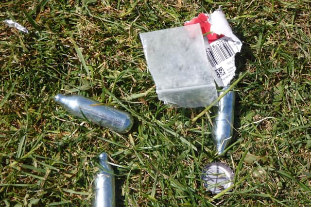 Nitrous oxide canisters were strewn around the park.
