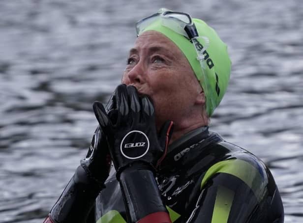 Emotional: Donna is thinking of Christopher as she completes her swim