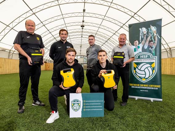 The Hanlon Stevenson Foundation have donated defibrillators to four local youth clubs – Hutchison Vale, Leith Athletic, Salvesen and Street Soccer Scotland.
Hibernian duo Lewis Stevenson and Paul Hanlon were at World of Football in Edinburgh to make the presentation. Photo by Alan Rennie