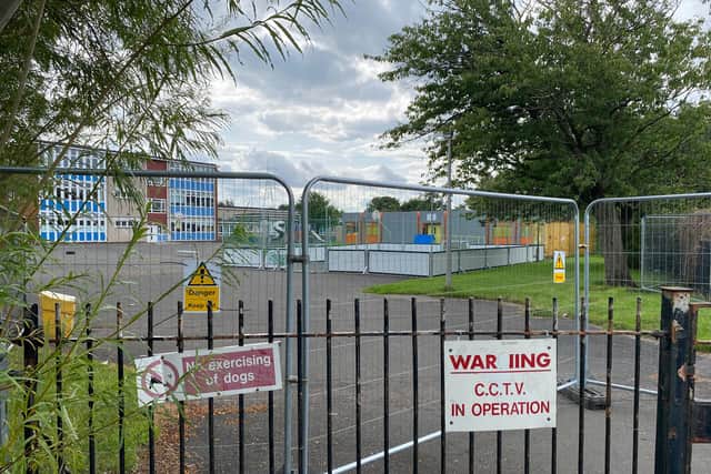The school has a large area cornered off in the playground