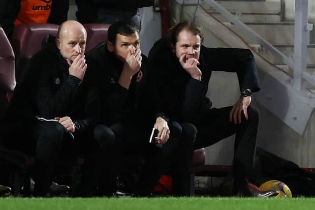 Hearts coaches Gordon Forrest and Lee McCulloch with manager Robbie Neilson.