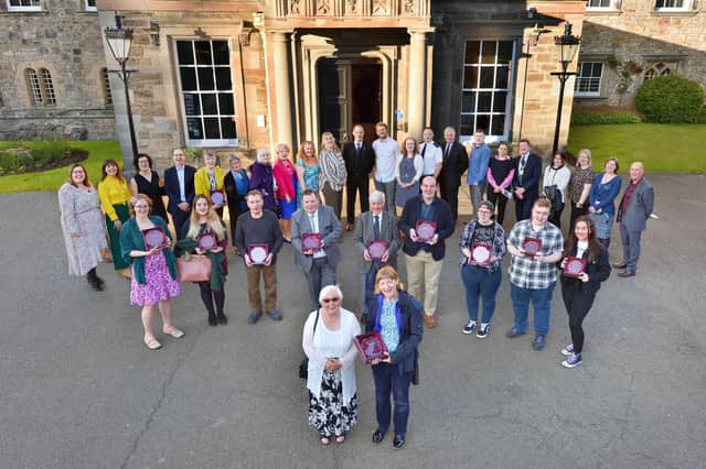 Stock photo of the winners at the Volunteers’ Week Awards ceremony at Newbattle Abbey College in 2019.