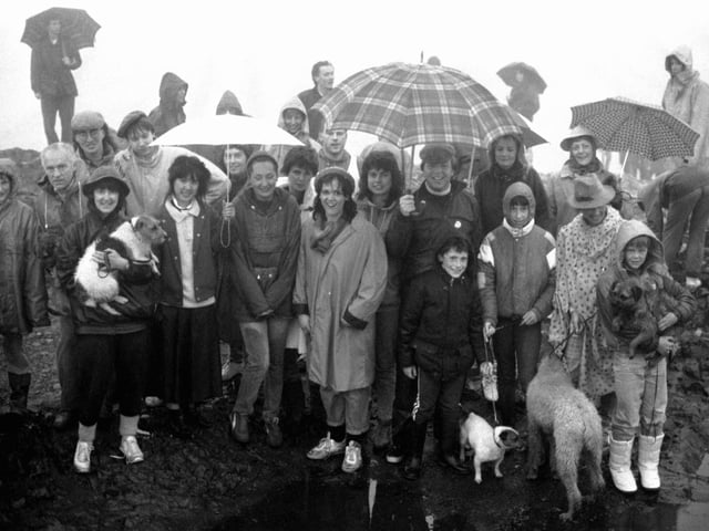 Walkers and their dogs brave the rain to attend a service at the top of Arthur's Seat on May Day in 1987.