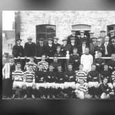 Dundee Hibernians and Edinburgh Hibernians (hooped shirts) teams and staff come together for a picture to mark their friendly match to open Tannadice Park in 1909