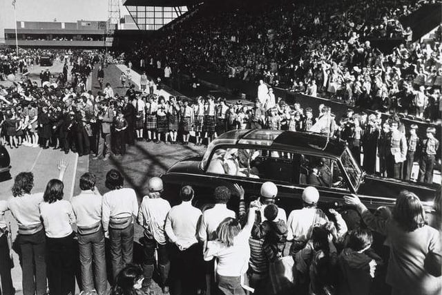 The Queen's 1977 Silver Jubilee visit to Edinburgh included a Pageant of Scottish Youth at Meadowbank Stadium, which had been built to host the Commonwealth Games seven years earlier.
Here, the Queen is cheered as she leaves the stadium after the pageant.