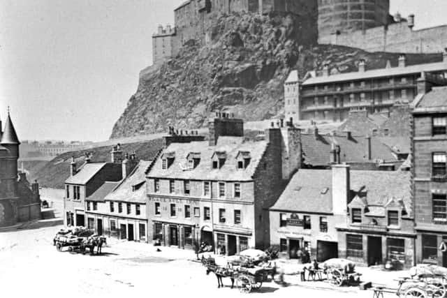 A 19th century view of the Grassmarket in Edinburgh's Old Town, showing the Castle, the Black Bull Inn (centre) and people with horse carts This picture was supplied by an Evening News reader from their glass negative collection.