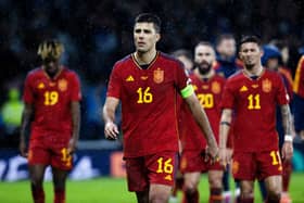Spain captain Rodri and teammates are dejected at full time after losing their UEFA Euro 2024 qualifier 2-0 at Hampden Park. Picture: Craig Williamson / SNS