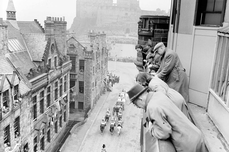 Looking down on the top of the Royal Mile as Queen Elizabeth II and the Duke of Edinburgh arrive at Edinburgh Castle for the traditional Ceremony of the Keys.