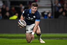 Scotland's Huw Jones scores the first try of the match against England at Twickenham. Picture: Craig Williamson / SNS
