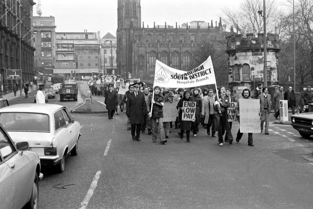 Traffic is held up as the Edinburgh South District hospital branch of NUPE (National Union of Public Employees) march up Lothian Road during the 'Day of Action' strike in January 1979.