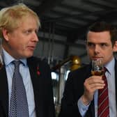 Boris Johnson should resign over the Partygate affair and Scottish Tory leader Douglas Ross should call for him to do so (Picture: Daniel Leal-Olivas/WPA pool/Getty Images)