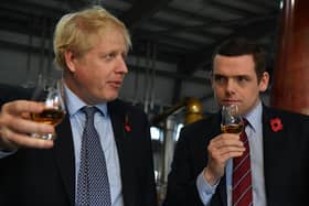 Boris Johnson should resign over the Partygate affair and Scottish Tory leader Douglas Ross should call for him to do so (Picture: Daniel Leal-Olivas/WPA pool/Getty Images)