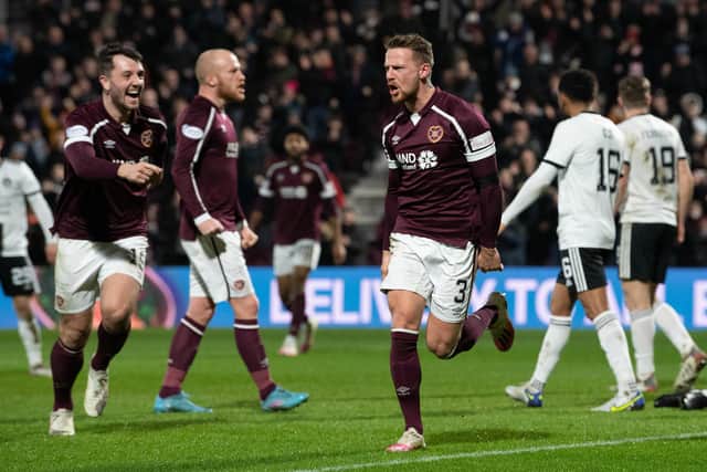 EDINBURGH, SCOTLAND - MARCH 02: Hearts' Stephen Kingsley celebrates after making it 2-0 during a Cinch Premiership match between Hearts and Aberdeen at Tynecastle, on March 02, in Edinburgh, Scotland.  (Photo by Ross Parker / SNS Group)