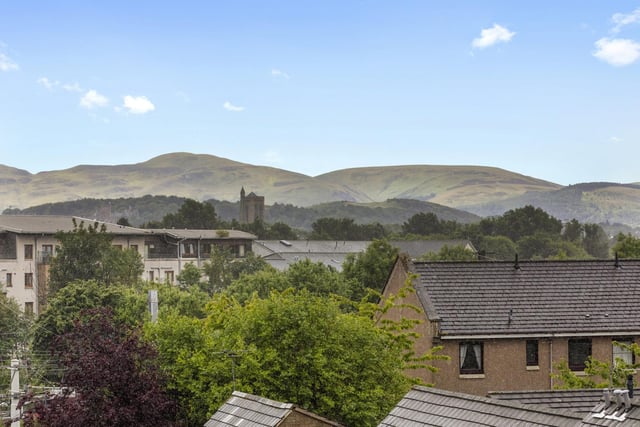 This home enjoys arguably the best position on the development, with gardens to the front, side and rear and fine southerly views to the Pentland Hills from the two balconies.