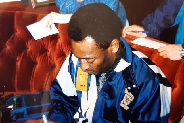 Pele was more than happy to talk to everyone there and give autographs to all the kids according to Jim.