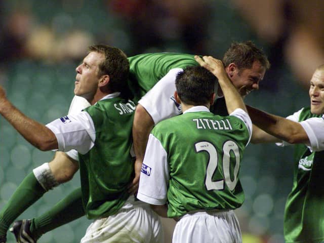 Franck Sauzee, left, David Zitelli, and Mixu Paatelainen (far right) celebrate John O'Neil's goal against Hearts in the 6-2 Edinburgh derby victory in October 2000