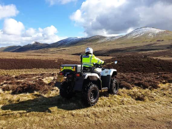 Police Constables Dolan and Hand from Penicuik Community Policing Team carried out Quad Bike patrols in the rural areas including The Pentland Hills (Photo: Police Scotland).