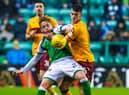 Scott Allan and Barry Maguire battle for possession in a meeting between the two teams at Easter Road last season