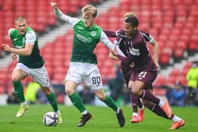Toby Sibbick in action against Hibs' Ewan Henderson during the Scottish Cup semi-final. Picture: SNS