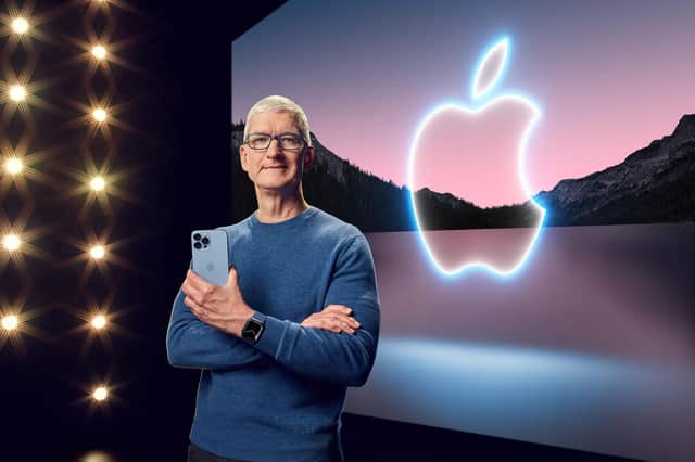 Apple CEO Tim Cook with the iPhone 13 Pro Max and Apple Watch Series 7 during a special event at Apple Park.