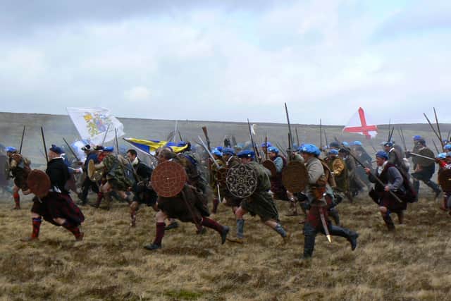 A reconstruction of the battle charge at Culloden in 1746. Development on the battlefield, of which two thirds is owned privately, has helped focus attempts for better protection of such historic sites . PIC: NTS.