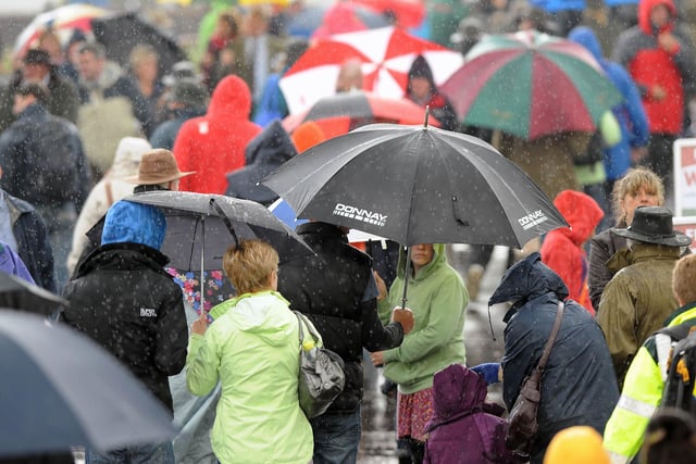 Even though it's June,  fine weather cannot be guaranteed.  Spectators at the 2012 Royal Highland Show had to walk through puddles after a thunderstorm struck.