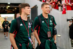 Will Fish, right, and Manchester United colleague Charlie McNeill inspect the pitch prior to the pre-season friendly match between United and Wrexham at the Snapdragon Stadium on Tuesday. Picture: Ash Donelon/Manchester United via Getty Images