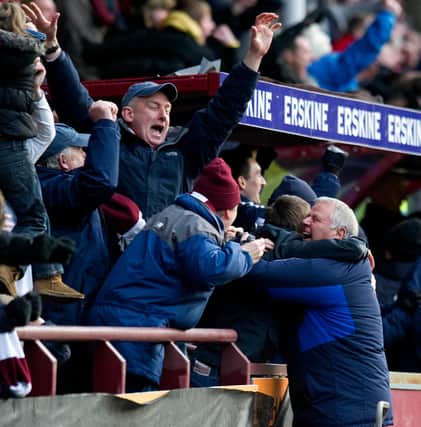 Hearts fans are delighted with Jim Jefferies return to the club. Picture: SNS