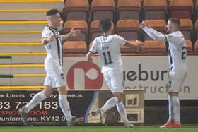Euan Murray, left, celebrates after putting Dunfermline 2-0 ahead. Picture: SNS