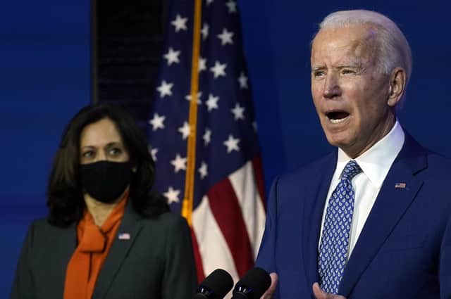 President-elect Joe Biden speaks in Wilmington, Delaware on Monday, as Vice President-elect Kamala Harris looks on (Picture: Carolyn Kaster/AP)
