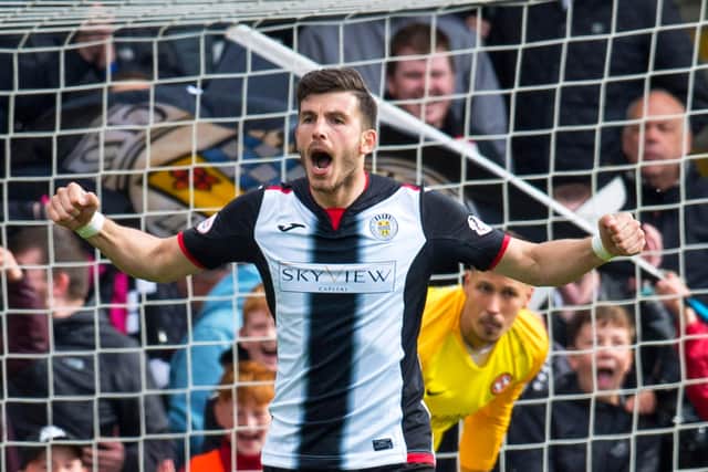 St Mirren's Mihai Popescu celebrates scoring for St Mirren during the play-off penalty shootout win over Robbie Neilson's Dundee United. Photo: Rob Casey/SNS Group