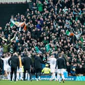 Hibs players celebrate in front of the away fans at full-time after successfully making it into the semi-finals of the Scottish Cup. Picture: SNS