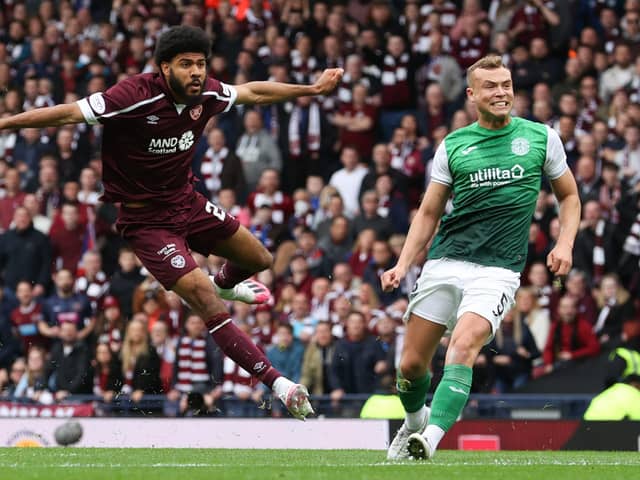 Ellis Simms scores Hearts' first goal against Hibs on Saturday.