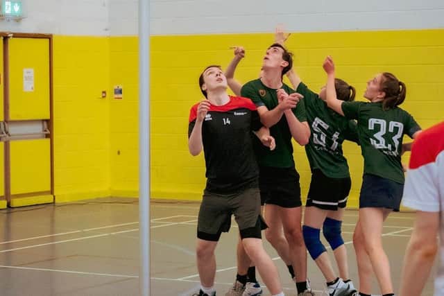 Korfball players in action