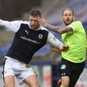 Iain Davidson in action against Hibs star Martin Boyle in October 2016. Picture: SNS