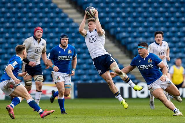Darcy Graham leaps to collect the ball during Scotland's 52-10 win over Italy. Picture: Ross Parker/SNS