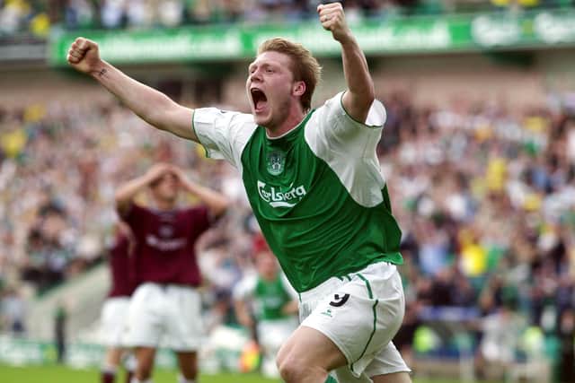 Garry O'Connor wheels away in delight after securing all three points for Hibs with an injury-time winner against Hearts in 2003. Picture: SNS