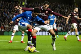 Toby Sibbick battles for possession with Malik Tillman during Hearts' 1-0 defeat to Rangers in November. Picture: SNS