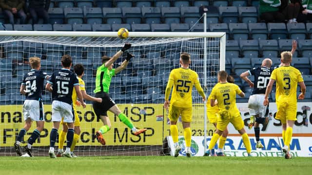 Matt Macey saves from Zak Rudden during Hibs' 3-1 defeat by Dundee
